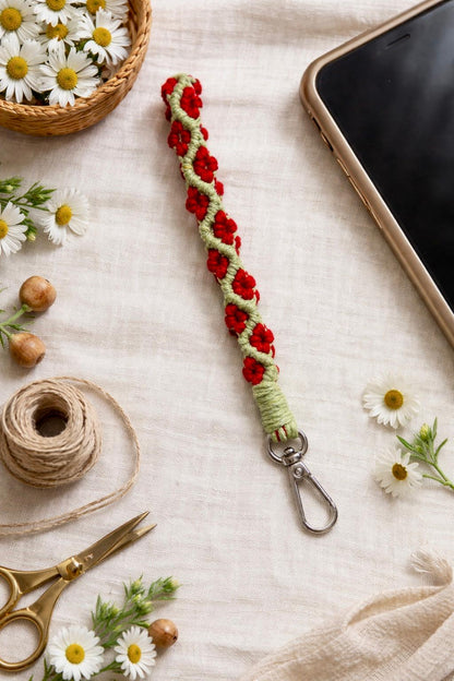 Handcrafted Floral Macrame Wrist Strap – Stylish & Secure (Red bloom)